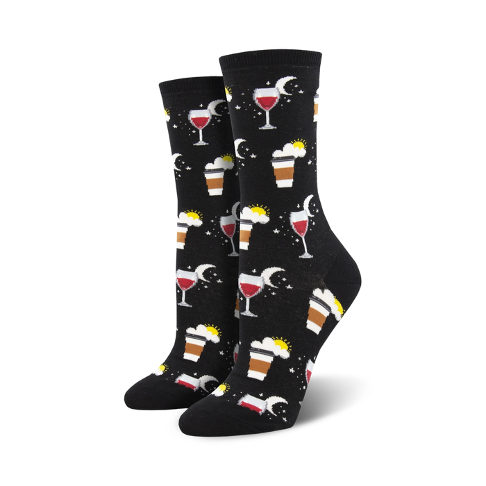 Pair of crew socks in black and blue, featuring a whimsical design of coffee cups, wine glasses, suns, and moons.