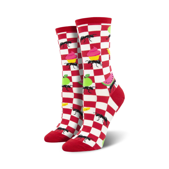 A pair of women's crew socks in red and white checkered pattern. Features ants, cupcakes, apples, and watermelon. }}