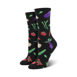 Pair of women's crew socks, black and yellow options, featuring colorful vegetable illustrations like tomatoes, carrots, and eggplant.