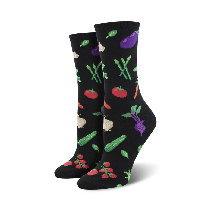 Pair of women's crew socks, black and yellow options, featuring colorful vegetable illustrations like tomatoes, carrots, and eggplant.