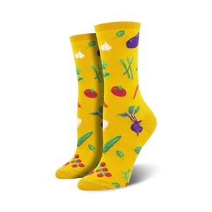 Lifestyle shot showing the yellow Veggie Might socks on a person's feet, highlighting their bright color and fun design.