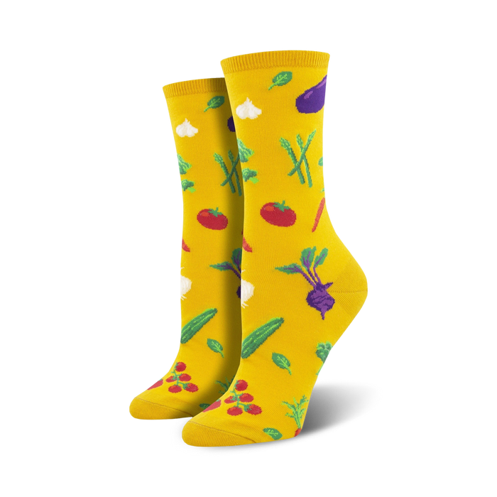 Lifestyle shot showing the yellow Veggie Might socks on a person's feet, highlighting their bright color and fun design.