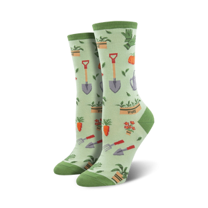 Lifestyle product shot showing the green Hoe Down socks on a model's feet.