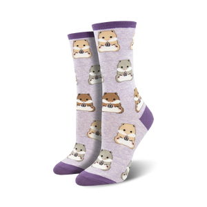 Pair of women's crew socks. Lavender background with repeating pattern of brown, beige and grey hamsters holding sunflower seeds. Purple cuffs.