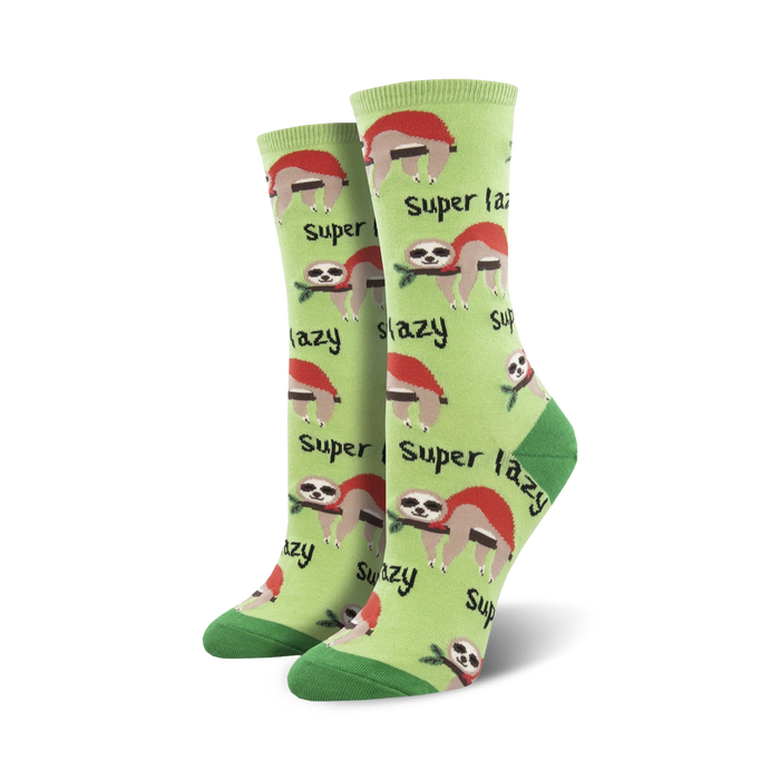 **alt text description:** green crew socks featuring sloths in red santa hats, hanging from branches, with 'super lazy' written beside them.  