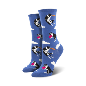 Pair of women's crew socks. Blue background with repeating pattern of black and white border collies catching pink and orange frisbees.