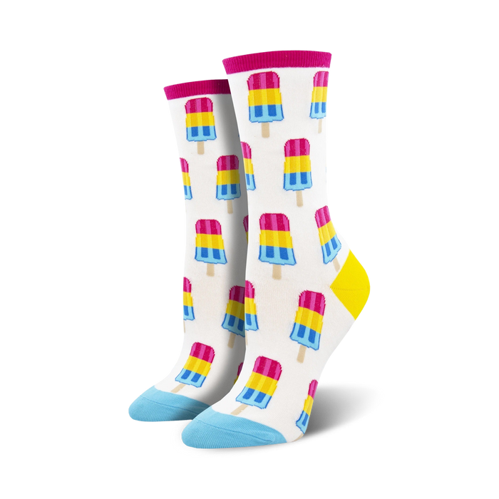 A pair of women's crew socks with a white background and repeating pattern of pink, yellow, and blue popsicles. }}