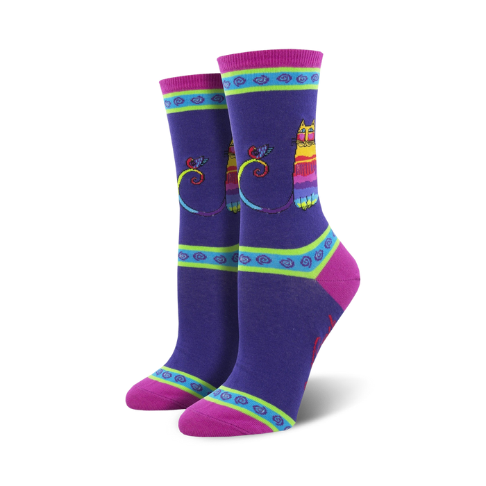 Lifestyle shot showing the purple Laurel Burch Rainbow Cat socks on a model's feet.