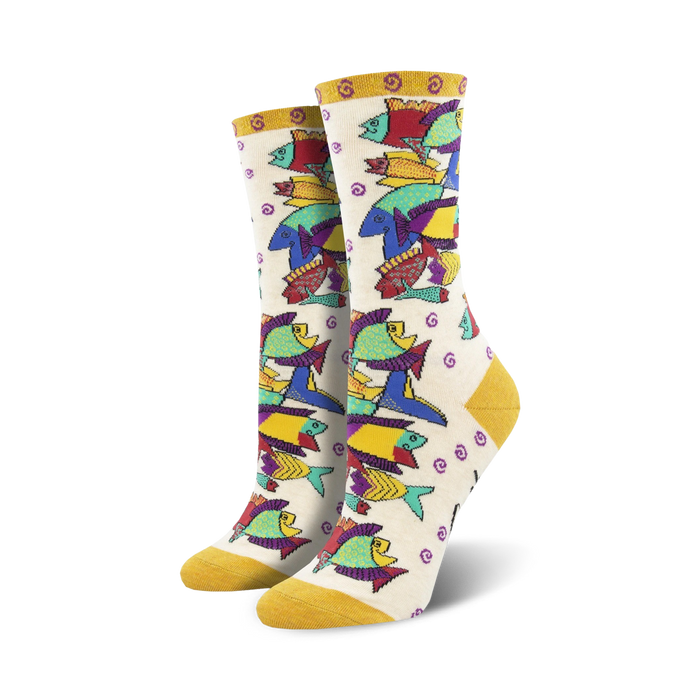 Cream crew socks with a whimsical design of multicolored fish. Yellow cuffs. Laurel Burch Pescadero. }}