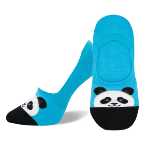 Lifestyle shot showing the bright blue panda no-show socks on a model's feet.
