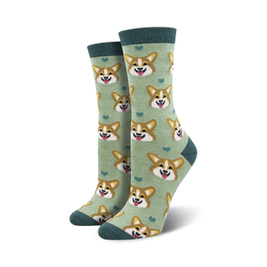 Lifestyle shot: A person's feet wearing the sage green corgi socks.