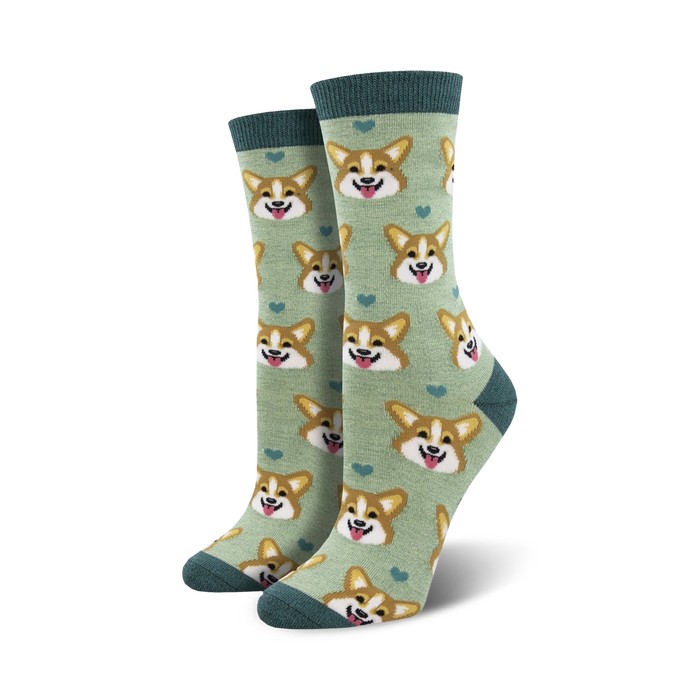 Lifestyle shot: A person's feet wearing the sage green corgi socks.