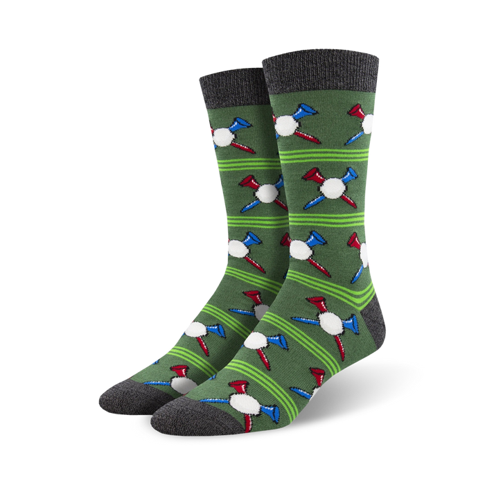 Pair of men's crew socks in green with repeating pattern of golf balls and tees in red, white, and blue.  Dark gray cuffs. }}
