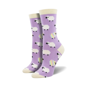Pair of lavender crew socks with a whimsical pattern of white sheep and rainbow sheep accents.  Off-white cuff.