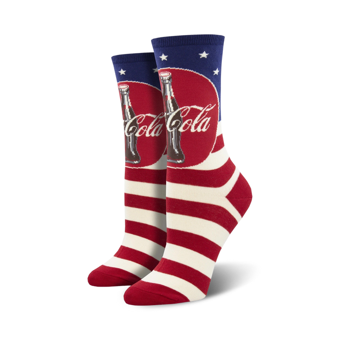 Pair of crew socks with red and white stripes, a Coca-Cola logo, and an American flag motif. }}