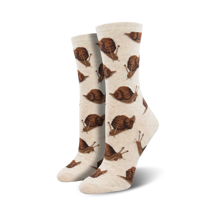 Pair of cream crew socks with repeating brown snail pattern.  Fun and quirky design.
