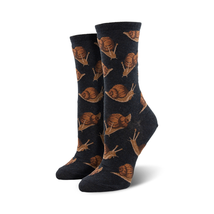 Close-up of dark grey crew socks with a repeating pattern of brown snails.