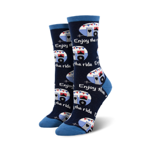 red and white vintage campers adorn these women's crew socks on a blue background.  
