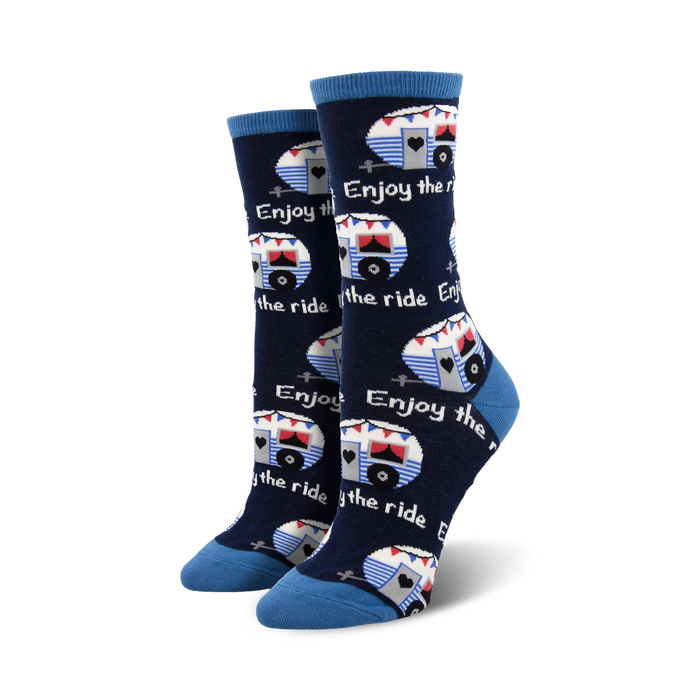 red and white vintage campers adorn these women's crew socks on a blue background.  