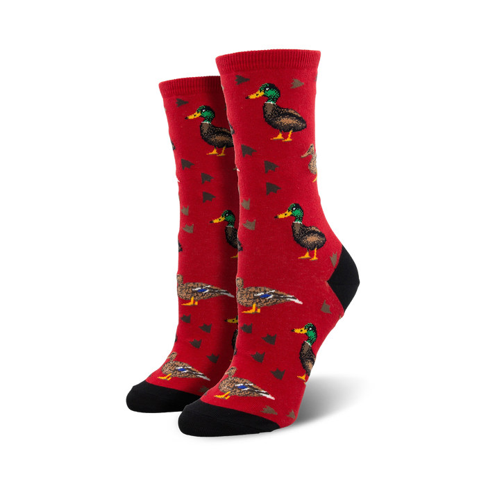 red crew length socks with cartoon duck pattern in brown, black, and teal.   