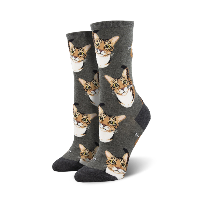 Pair of women's crew socks; grey background with repeating pattern of brown tabby cat faces and the word 'Boop'.
