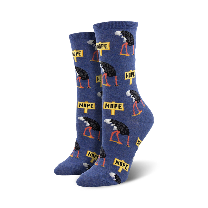 Pair of crew socks; blue background with repeating pattern of ostriches hiding their heads and 'Nope' signs.