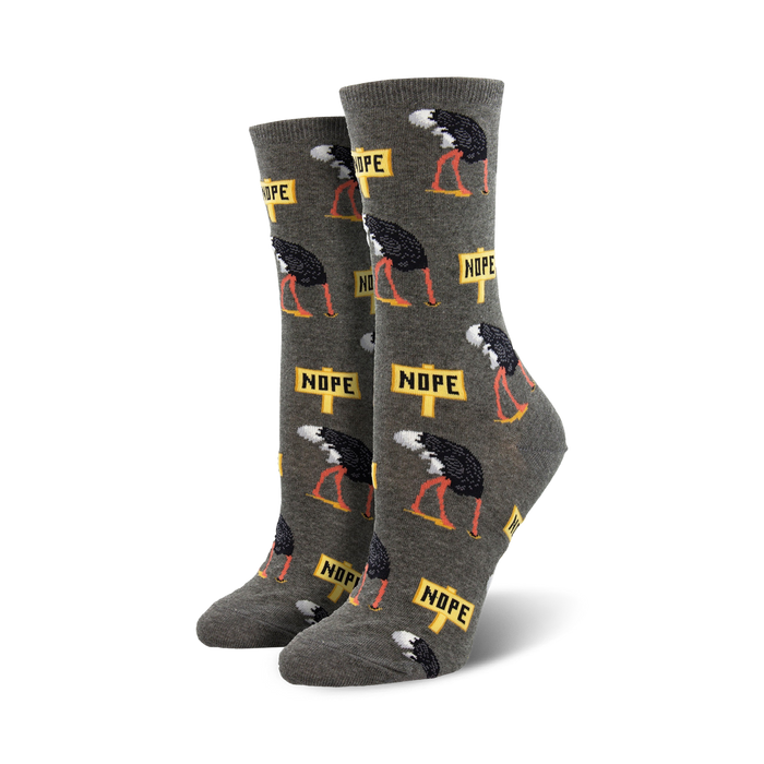 gray crew socks with ostrich burying head in sand pattern, yellow nope signs.  