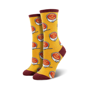 Pair of crew socks; yellow background with red soup bowls that say 'Hang in there' and 'Proud of you'.