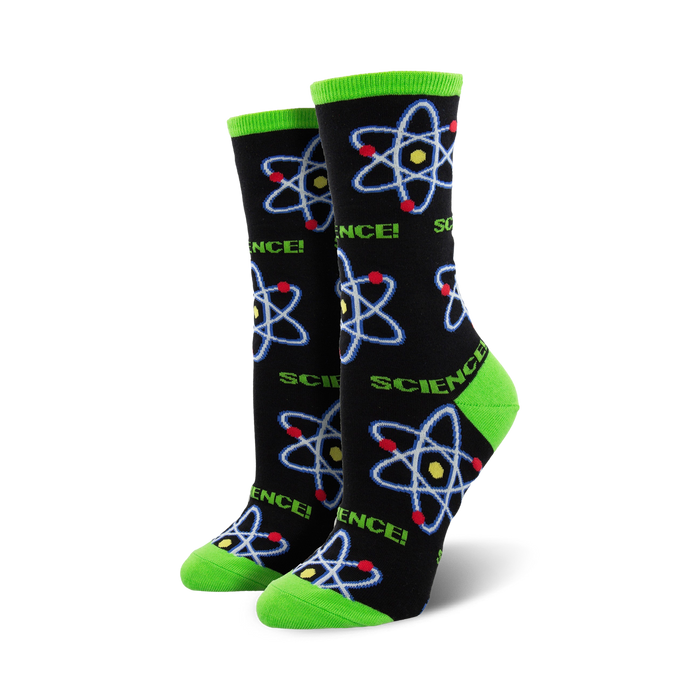 A pair of black crew socks with colorful atom designs and the word 'SCIENCE!' Lime green accents at the cuffs add a pop of color. }}