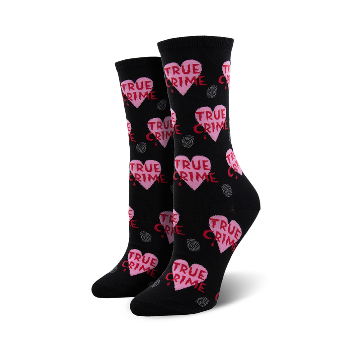 Pair of black crew socks featuring a repeating pattern of pink hearts with 'TRUE CRIME' text and gray fingerprints. }}