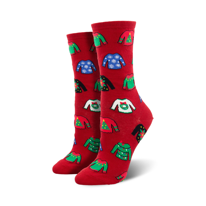 Close-up showing the detail of the colorful ugly Christmas sweater patterns on the red socks.