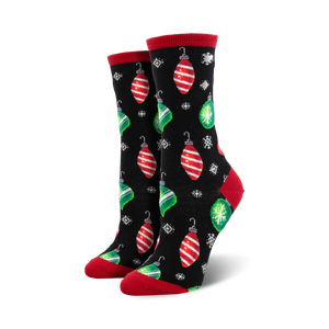 Pair of women's crew socks.  Black and navy background with red and green Christmas ornament designs and snowflakes.