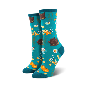 Pair of teal crew socks with a Thanksgiving-themed pattern: roasted turkeys, pumpkins, pie, and fall foliage.
