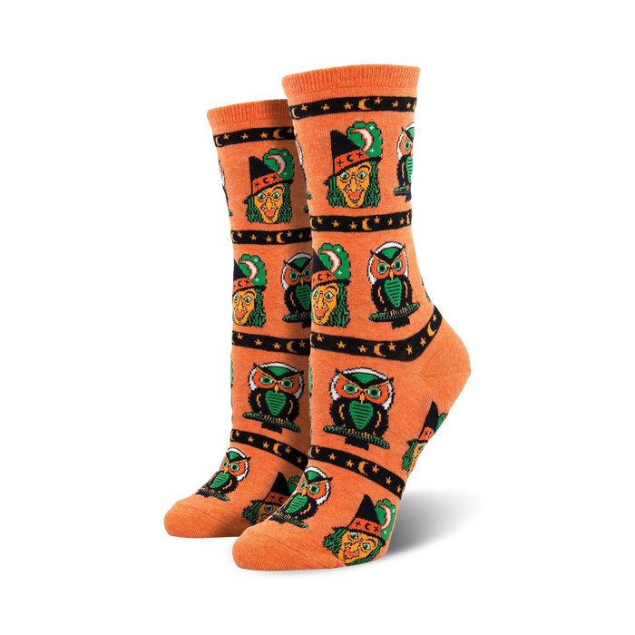 Close-up of orange Witchcraft Wonders socks showcasing the pixelated witch and owl design.
