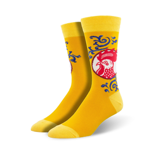 Pair of crew socks; yellow, red, and blue; featuring a rooster design within a circular emblem.