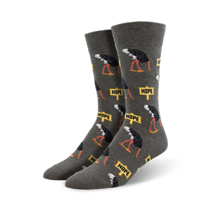 Close-up of a pair of gray 'Nope' socks showcasing the ostrich and 'Nope' sign design.