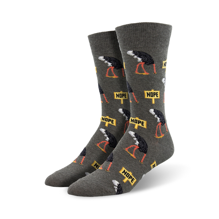 Close-up of a pair of gray 'Nope' socks showcasing the ostrich and 'Nope' sign design.