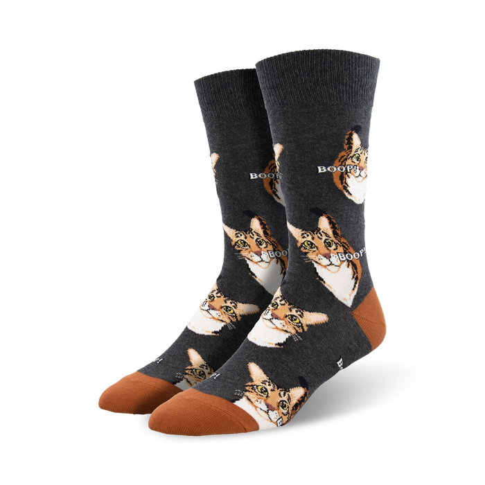 mens dark gray cotton crew socks decorated with a pattern of cartoon cats with tongue sticking out.    }}
