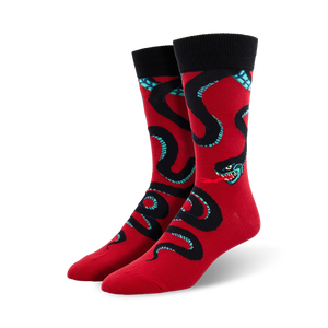 red crew socks for men with a pattern of black, blue, and green snakes slithering around them, mouths open with red tongues sticking out.   