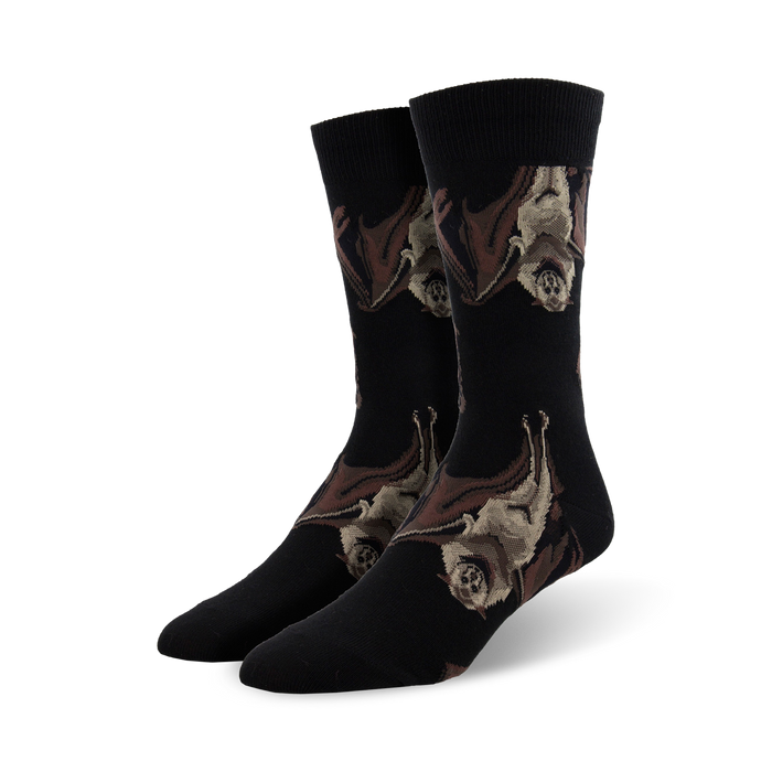 Pair of black crew socks with a pattern of brown and tan bats hanging upside down. }}