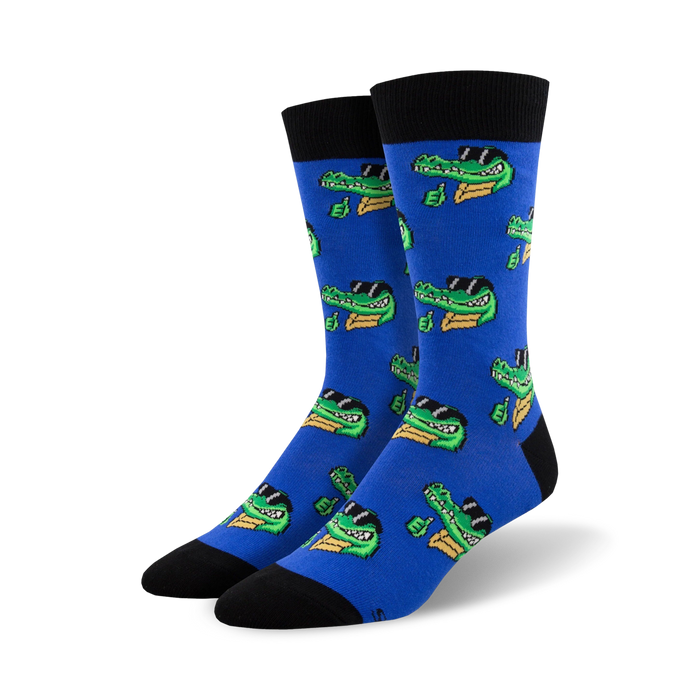 men's crew socks, blue with an all-over pattern of cartoon green and yellow crocodiles wearing sunglasses and giving a thumbs up.   }}