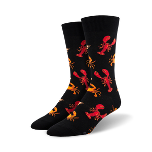 black crew socks with pattern of red lobsters and yellow crabs. fun and kitschy seafood design.  