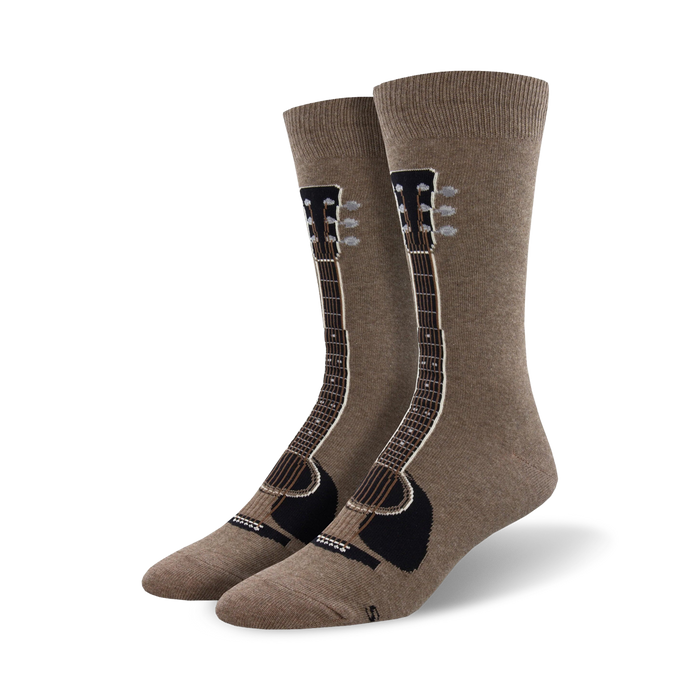 Pair of taupe crew socks with a detailed guitar graphic, showcasing the guitar neck, headstock, and tuning pegs. }}