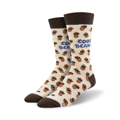A pair of cream crew socks with brown bean characters wearing sunglasses. The socks have a 'Cool Beans' text and brown cuffs.