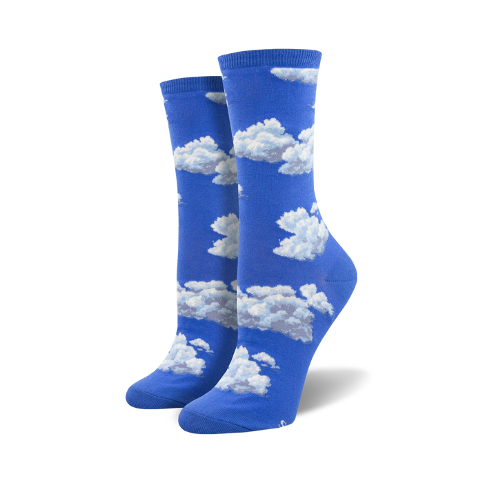 Pair of women's crew socks in blue with a white cloud pattern.  The socks are comfortable and fun. }}