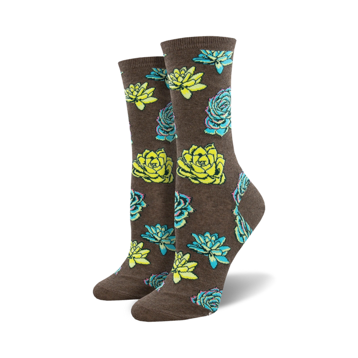 Pair of women's crew socks with a whimsical succulent print.  The socks are brown with teal and lime green succulents.