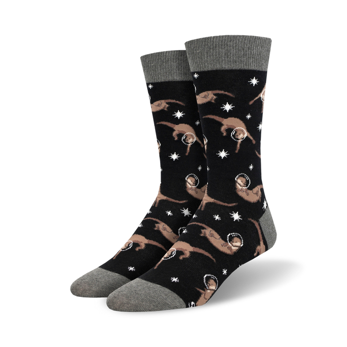black crew socks adorned with an adorable pattern of cartoon otters wearing space helmets against a starry background.    }}