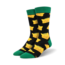 black crew socks with yellow cartoon cat faces wearing tacos on their heads.   
