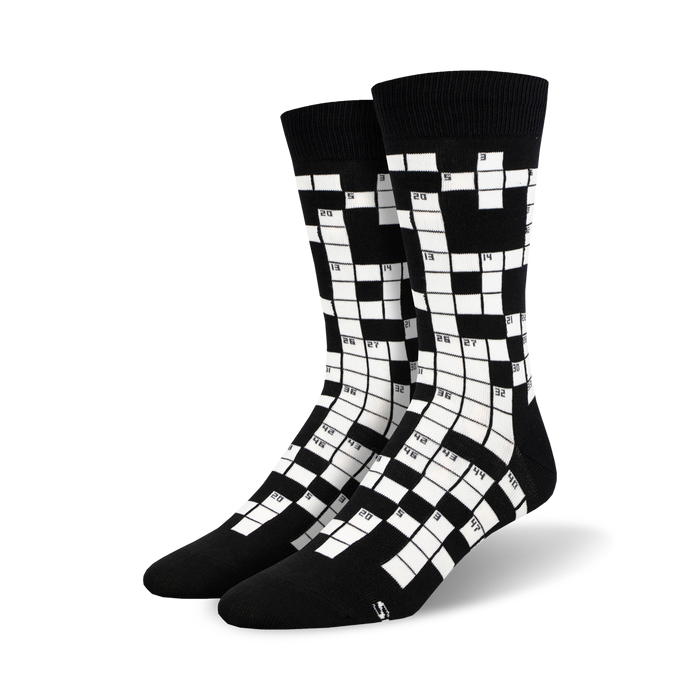 men's crew socks with crossword puzzle pattern in black and white.   }}