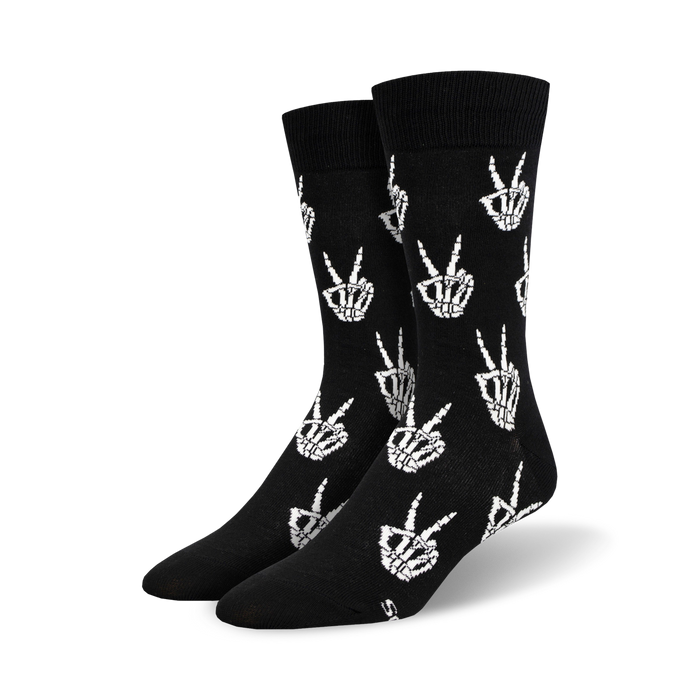Pair of black crew socks with a repeated pattern of white skeleton hands making peace signs. }}